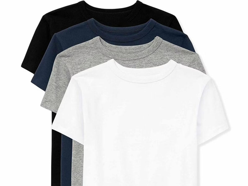 Four basic crew neck T-shirts layered in white, gray, navy, and black