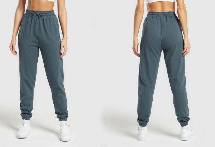 Men’s blue-gray jogger sweatpants shown from front and back with elastic waistband and tapered ankle cuffs.