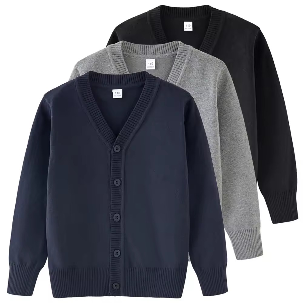 Three button-up cardigans layered in navy, gray, and black on plain background