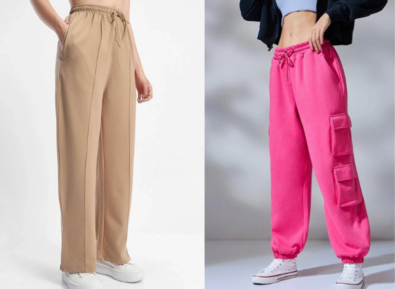 Two women wearing beige wide-leg sweatpants and bright pink cargo joggers.
