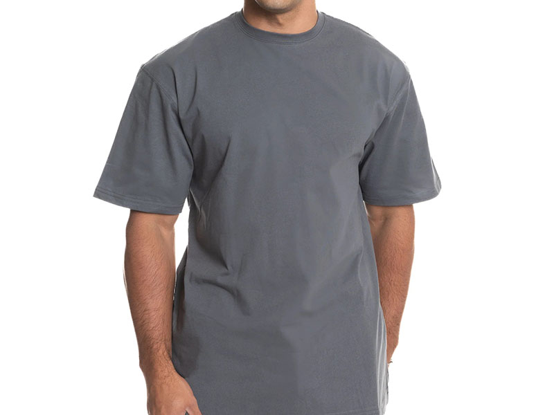 Man wearing dark gray T-shirt standing against plain white background