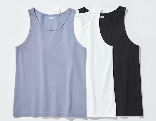 Three sleeveless tank tops in lavender, white, and black laid flat together.