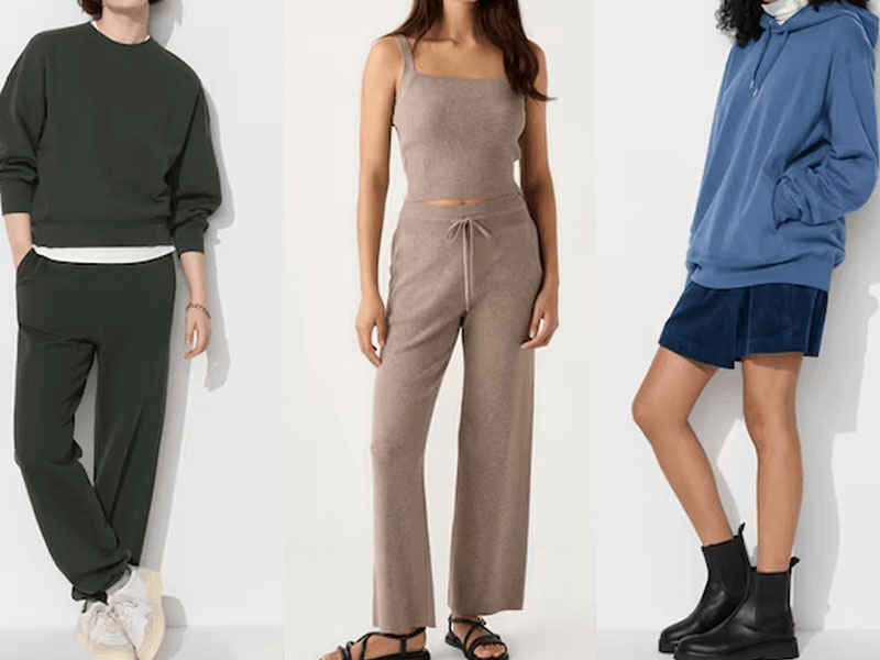 Three people modeling casual loungewear: left in dark green sweatshirt and pants, center in beige tank top and wide-leg pants, right in blue hoodie with navy shorts and black boots.
