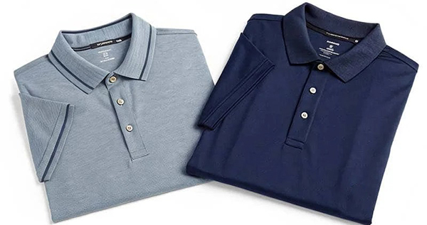 Two folded polo shirts in light blue and navy with classic collars and buttons.