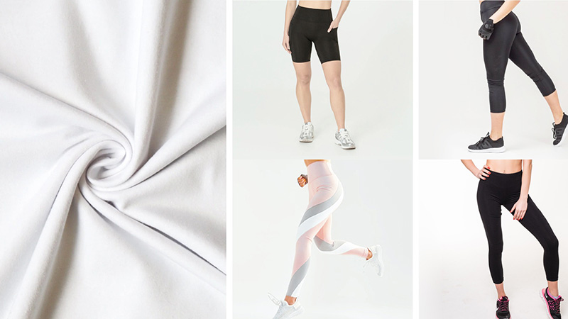 White stretch fabric with examples of black bike shorts, cropped leggings, and patterned athletic leggings.