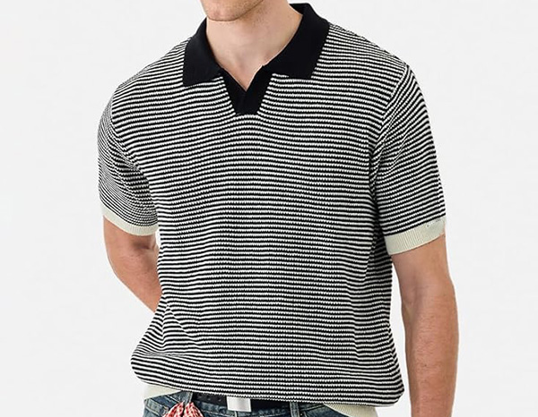 Man wearing black and white striped knit polo shirt with dark collar and short sleeves.