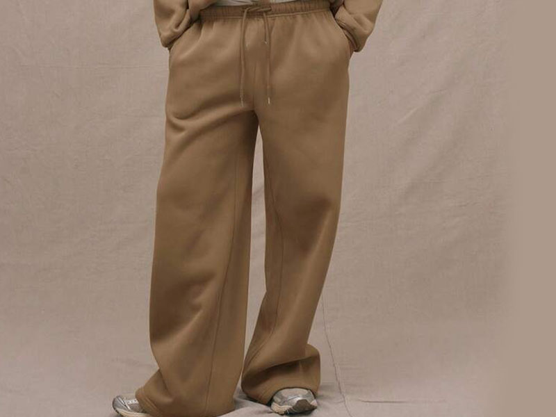 Brown relaxed fit sweatpants with drawstring waist and loose comfortable silhouette
