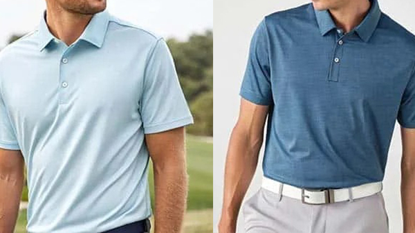 Two men wearing light blue and slate blue short-sleeve polo shirts.