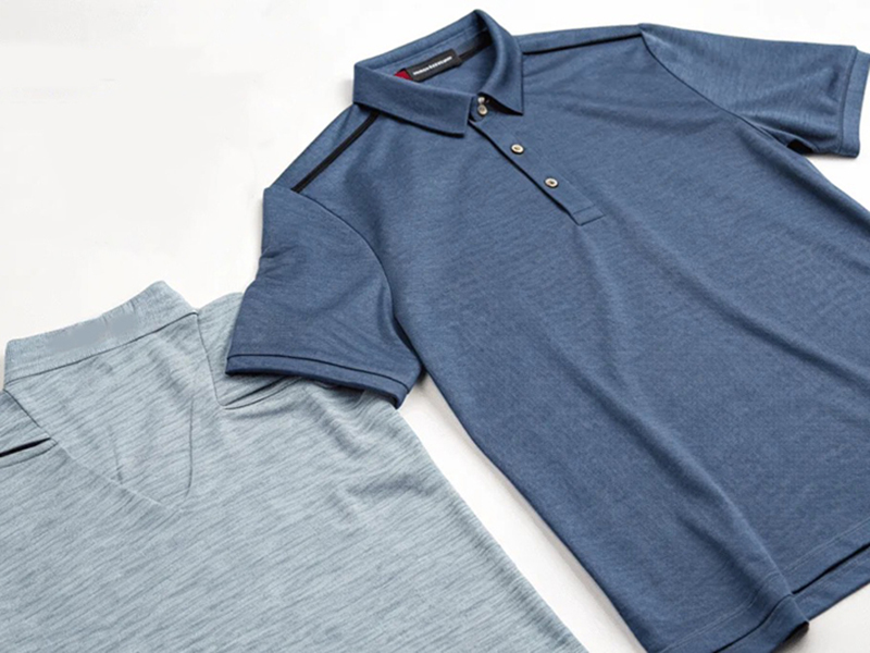 Blue and gray jersey polo shirts displayed flat with soft knit fabric texture and modern casual apparel design