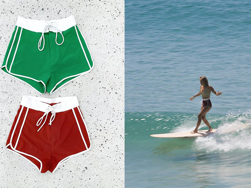 Two pairs of women's boardshorts, one green and one red, displayed next to a woman surfing on a wave.