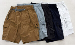 Assortment of lightweight cargo shorts in multiple colors featuring utility pockets, adjustable waistbands, and durable outdoor-inspired design for casual wear and travel.