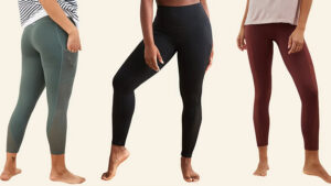 Three women wearing high-waisted leggings in green, black, and burgundy, standing barefoot on a neutral background.