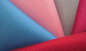 Colorful woven fabric swatches arranged neatly for selection